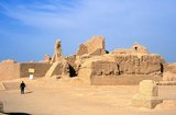 The ruins of Karakhoja or Gaochang Gucheng (Gaochang Ancient City) date from the initial Han Chinese conquest of the area in the 2nd century BCE.<br/><br/>

Located about 46km southeast of Turpan on the edge of the Lop Desert, Karakhoja is larger than Yarkhoto, but rather less well preserved. Originally established as a garrison town, it developed into a prosperous city by Tang times, before being eventually abandoned in the 14th century, probably due to a combination of endemic warfare and desertification. In its prime, Karakhoja was divided into three sections – an outer city, inner city, and palace area.