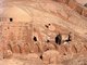 China: Men working on a tomb in the cemetery next to the village of Tuyoq near Turpan, Xinjiang Province